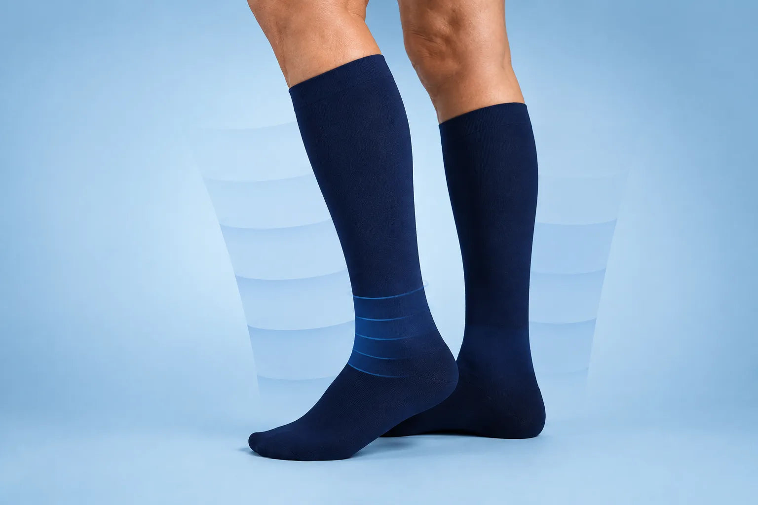 Navy knee-high closed-toe socks with pressure cues strongest around the ankle and lighter toward the calf